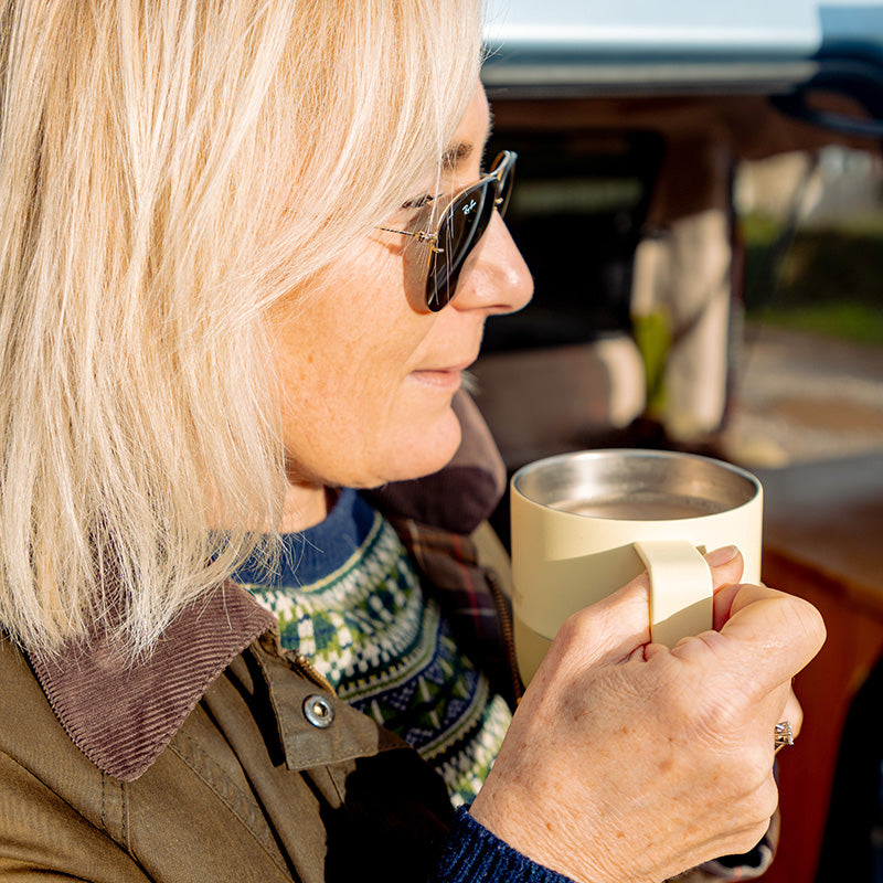 12oz-rise-mug-s6 12oz_rise_coffee_mug_wax_yellow_woman_drink_closeup_square.jpg