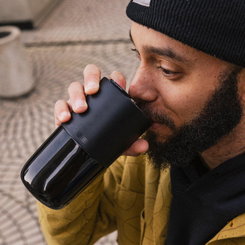 16oz-rise-tumbler-v2 16oz_rise_tumbler_black_man_drink_square.jpg