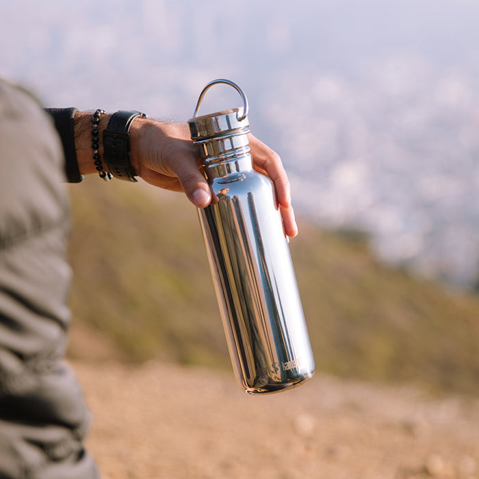 27oz-reflect-with-bamboo-cap-g5 K27SSLRF-MS-BAMBOO_reflect_bottle_hand_lifestyle.jpg