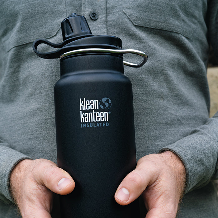 tkwide-chug-cap-z7 K32TKWSSL-SB-Craddled-Bottle_closeup_lifestyle.jpg