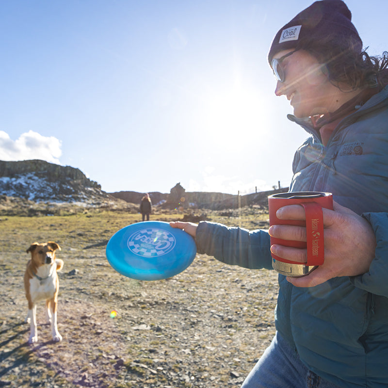 12oz-camp-mug-d4 insulated_camp_mug_12oz_woman_dog_frisbee_square.jpg