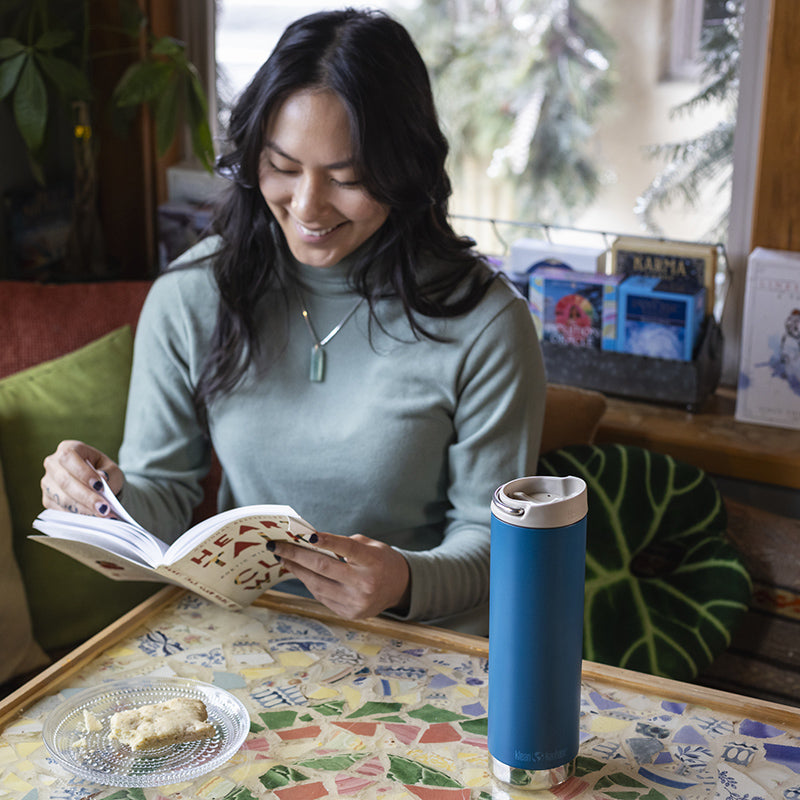 20oz-tkwide-with-cafe-cap-f7 tkwide_20oz_insulated_tumbler_cafe_woman_reading_square.jpg